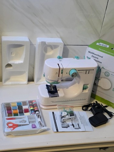 Portable sewing machine with - sewing,